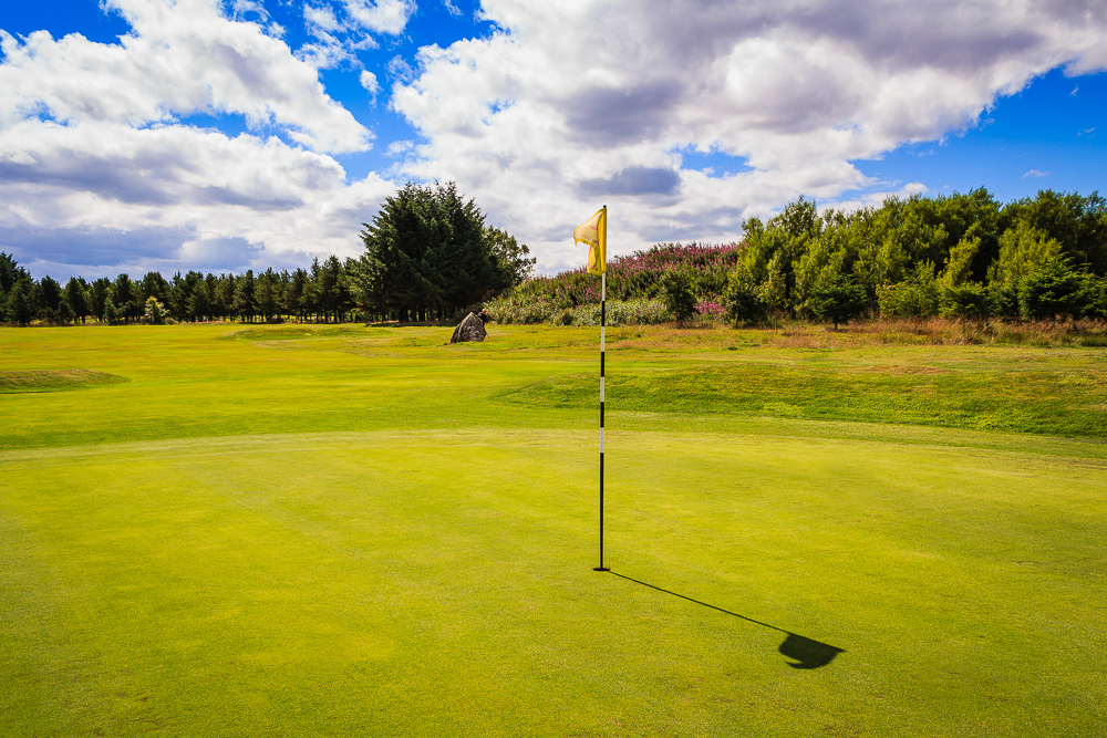 image of course and flag at putting green